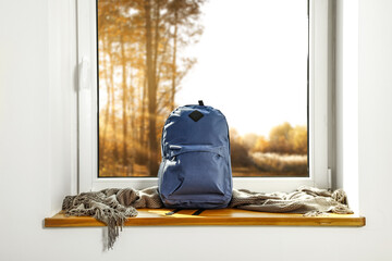 Wall Mural - School backpack on window sill and free space for your decoration. 