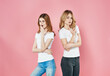 © SHOTPRIME STUDIO - two women in white t-shirts modern summer style friendship emotions pink background