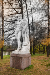 Russia, Saint-Petesburg, October 2020: Antique sculptures of man in the Central Park of Culture and Recreation on Yelagin Island in St. Petersburg