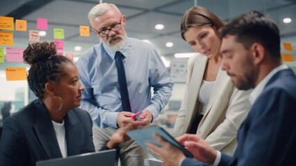 Aufkleber - In Modern Office: Diverse Team of Managers Use Laptop and Tablet Computers at a Company Meeting Discussing Business Projects. Young, Motivated and Experienced Employees Brainstorm in Conference Room.