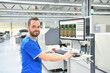 © industrieblick - production of electronic components in a modern factory - engineer at the workplace