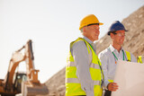 Fototapeta  - Business people and workers standing in quarry