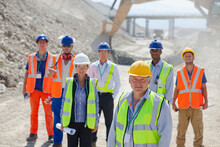 Business People Standing In Quarry