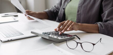 Woman Accountant Using Calculator And Computer In Office Panoramic Banner, Finance And Accounting Concept