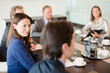 © KOTO - Business people talking in meeting