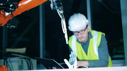 Wall Mural - bionic mechanisms under observation of a construction engineer