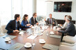 © KOTO - Business people talking in meeting