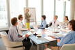 © KOTO - Business people talking in meeting