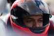 © KOTO - Close up of racer wearing helmet