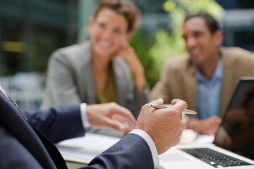 Business people talking in meeting