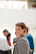 © KOTO - Businesswoman smiling in meeting