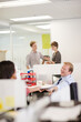 © KOTO - Business people talking in office