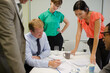 © KOTO - Business people talking in meeting