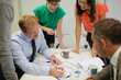 © KOTO - Business people talking in meeting