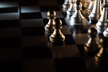 Poster - View of chessmen on a chessboard-concept of a strategy