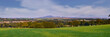 Panoramic view of the green Scottish countryside with Tinto Hill at the far distance