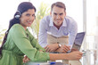© KOTO - Businesswoman talking on headset in office