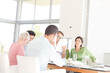 © KOTO - Business people talking in meeting