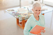 © KOTO - Businesswoman smiling in office