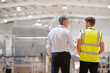 © KOTO - Supervisor and worker talking in warehouse