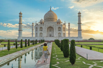 Fototapete - Taj Mahal Agra with moody sunrise sky. A UNESCO World Heritage site at Agra India	
