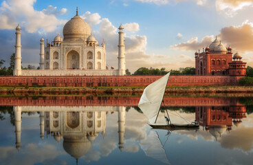 Fototapete - Taj Mahal at sunset with water reflection and fishing boat on river Yamuna at Agra, India