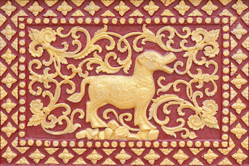 Canvas Print - Traditional Thai style stucco or  high-relief sculpture of pig of 12 Zodiac,on the wall of temple in Thailand