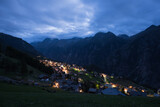 Fototapeta Na drzwi - The village of “Grächen” in Valais in Switzerland in the late evening in the dark. 