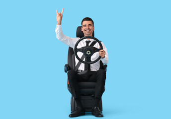 Sticker - Businessman in car seat and with steering wheel showing 