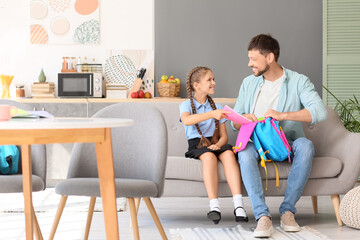 Poster - Father getting his little daughter ready for school