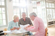 © KOTO - Business people working together at table