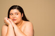 © Phiwo Ndlovu/Cultura Creative - Studio portrait of shirtless young woman