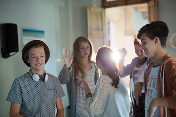 Wall Mural - Group of teenagers dancing in living room