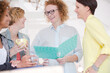© KOTO - Portrait of female colleagues smiling in office