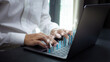 © kelvn - Business finance technology and investment concept, Man typing keyboard on laptop or computer