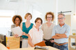 © KOTO - Group portrait of smiling office workers