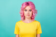 © deagreez - Photo of young nervous pink hairdo lady bite lip wear yellow t-shirt isolated on teal color background