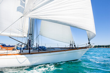 Wall Mural - luxury wood yacht sailing under wind
