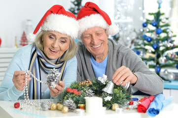 Canvas Print - Close up portrait of seniors preparing for Christmas