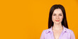 © Lustre Art Group  - Close-up portrait of young beautiful girl isolated on orange studio background