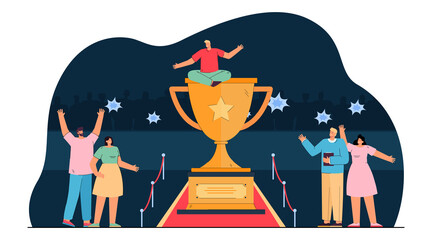 Wall Mural - cartoon man sitting on huge gold trophy cup on red carpet. happy business people celebrating victory