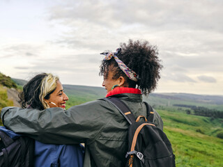 Female couple hiking in countryside