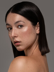 beautiful swedish girl with natural freckles. portrait of beauty young woman with nude shoulder.