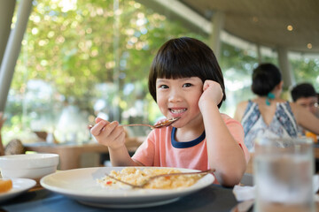 Wall Mural - Little girl have breakfast, happy time
