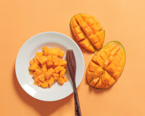 Wall Mural - Fresh mangoes are suitable as a snack menu in the morning or snacks during your spare time. Mango is rich in vitamin A which is good for the body which has the potential to prevent diabetes. 