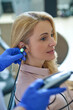 © zinkevych - Calm attractive blonde middle-aged woman having her hearing checked