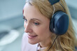 © zinkevych - Joyous female patient daydreaming during a hearing screening procedure