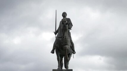 Poster - A low angle 4K video of a horseman statue under a cloudy skyline