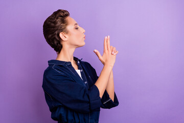 Wall Mural - Profile photo of cool brunette lady show gun wear jeans shirt isolated on violet color background