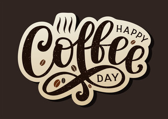 Happy coffee day lettering sticker decorated by coffee beans. Hand sketched design as coffee day banner.